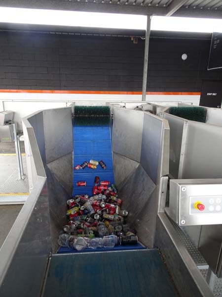 automatic sorting begins with separating containers on a conveyor line